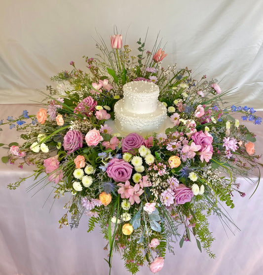 Use Model S12 trays upside down in Harlo frame and fill platform with wet foam to design flowers.